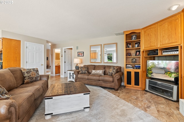 living area featuring visible vents