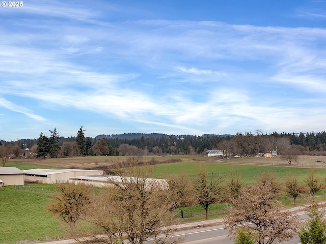 mountain view featuring a rural view and a forest view