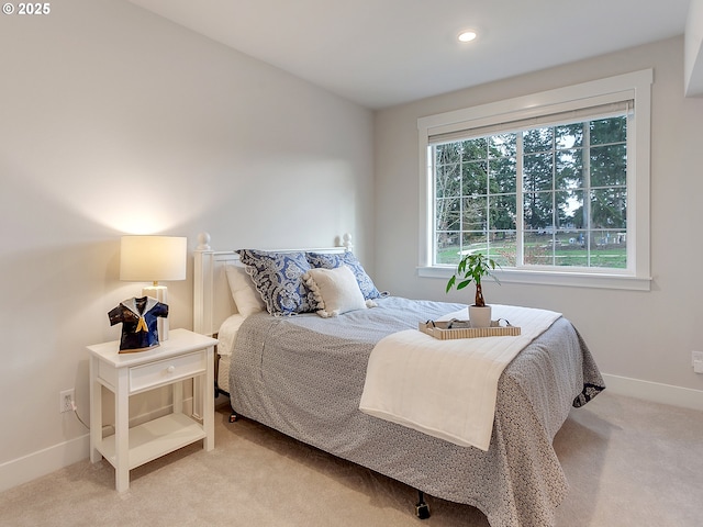 bedroom featuring recessed lighting, baseboards, and light carpet