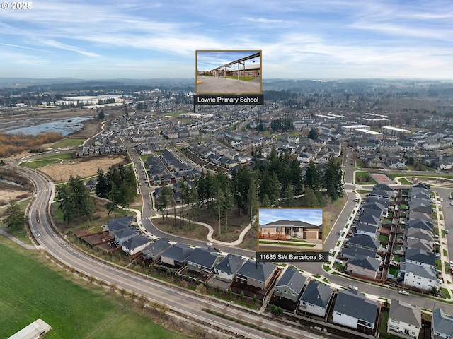 birds eye view of property with a residential view