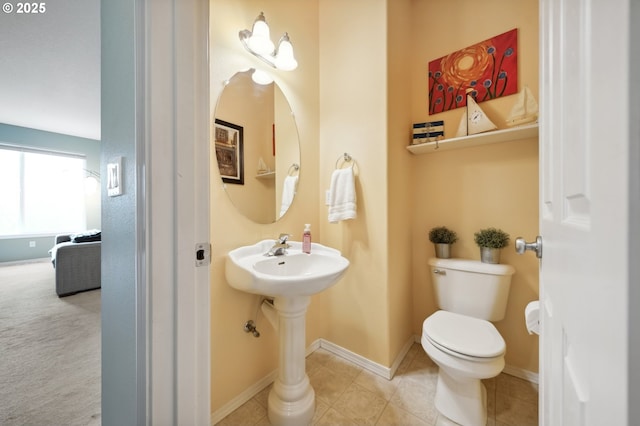 bathroom featuring toilet