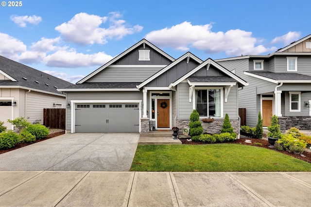13610 NE 109th Way, Vancouver, WA 98682 - craftsman inspired home with board and batten siding, a garage, concrete driveway, and stone siding