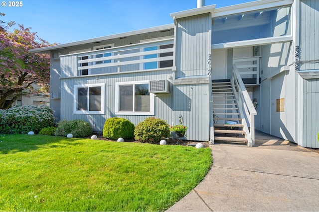 650 Harlow Rd Unit 240, Springfield, OR 97477 - back of property featuring a lawn and stairway
