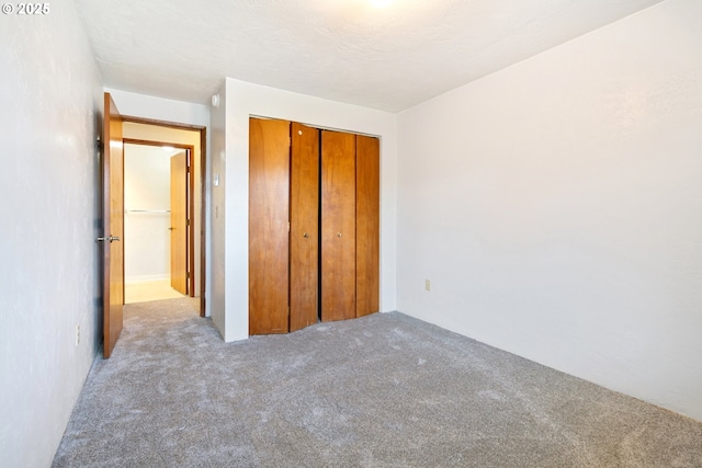 650 Harlow Rd Unit 240, Springfield, OR 97477 - unfurnished bedroom featuring a closet and carpet flooring