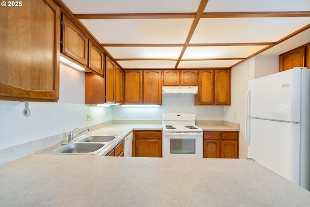 650 Harlow Rd Unit 240, Springfield, OR 97477 - kitchen with a sink, white appliances, brown cabinets, light countertops, and under cabinet range hood