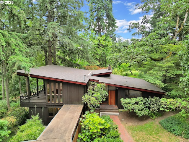 450 Horizon Rd, Eugene, OR 97405 - view of front of house with a deck and a forest view