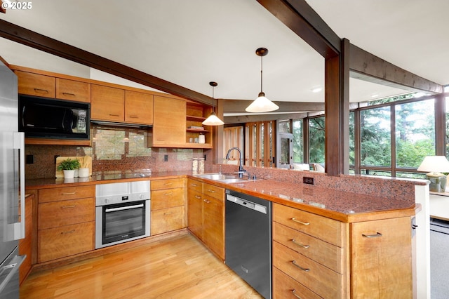 450 Horizon Rd, Eugene, OR 97405 - kitchen featuring black appliances, a peninsula, light wood finished floors, tasteful backsplash, and open shelves