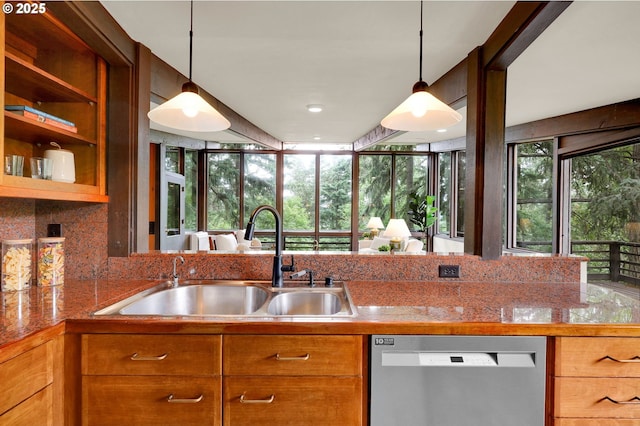 450 Horizon Rd, Eugene, OR 97405 - kitchen with dishwasher, brown cabinets, tile countertops, and decorative light fixtures