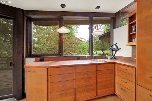 450 Horizon Rd, Eugene, OR 97405 - kitchen featuring tile countertops, open shelves, and pendant lighting