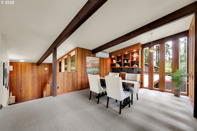 450 Horizon Rd, Eugene, OR 97405 - carpeted dining space featuring beamed ceiling, a wall mounted air conditioner, and wooden walls