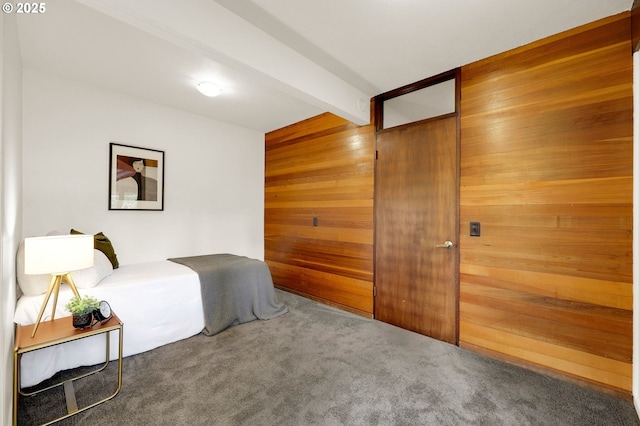 450 Horizon Rd, Eugene, OR 97405 - bedroom with wooden walls, carpet flooring, and beam ceiling