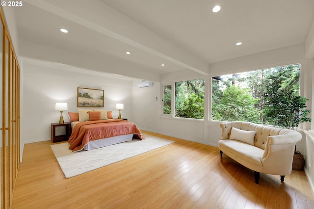 450 Horizon Rd, Eugene, OR 97405 - bedroom with a wall mounted air conditioner, light wood finished floors, recessed lighting, and beamed ceiling