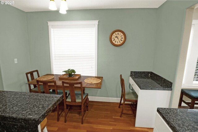 2146 NW Jetty Ave, Lincoln City, OR 97367 - dining space with wood finished floors, healthy amount of natural light, and baseboards
