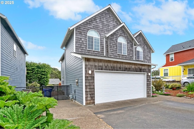 2146 NW Jetty Ave, Lincoln City, OR 97367 - garage featuring driveway and fence