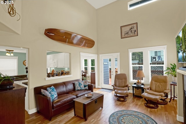 2146 NW Jetty Ave, Lincoln City, OR 97367 - living area with a high ceiling and light wood finished floors