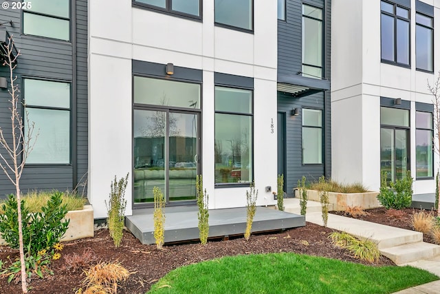 entrance to property with a wooden deck