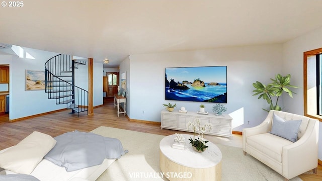 16151 Lower Harbor Rd, Brookings, OR 97415 - living room featuring stairway, wood finished floors, and baseboards