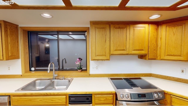 16151 Lower Harbor Rd, Brookings, OR 97415 - kitchen featuring stainless steel dishwasher, recessed lighting, a sink, and light countertops