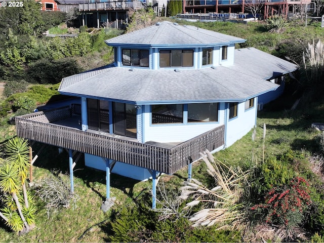 16151 Lower Harbor Rd, Brookings, OR 97415 - back of property with roof with shingles, a deck, and a sunroom