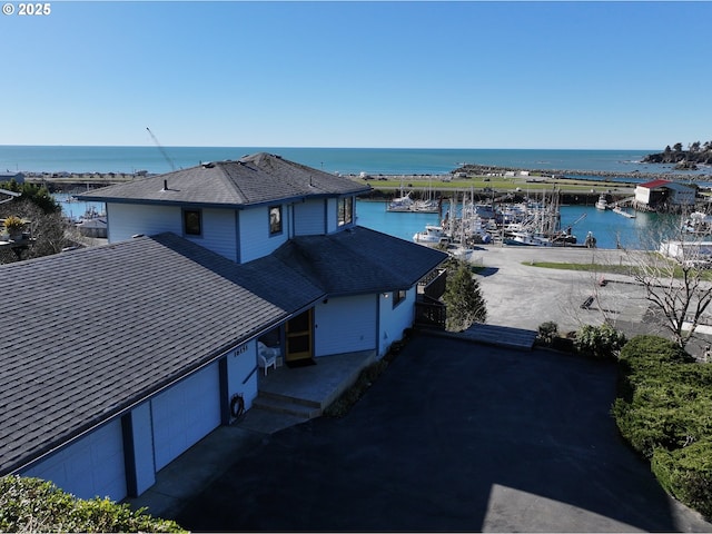 drone / aerial view featuring a water view