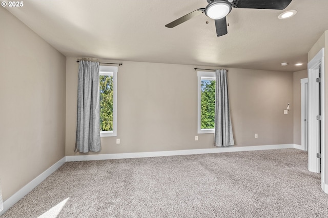 151 Alpha Dr, Longview, WA 98632 - spare room featuring baseboards, recessed lighting, carpet flooring, and a ceiling fan