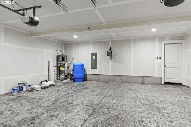 151 Alpha Dr, Longview, WA 98632 - garage with electric panel, hybrid water heater, and recessed lighting
