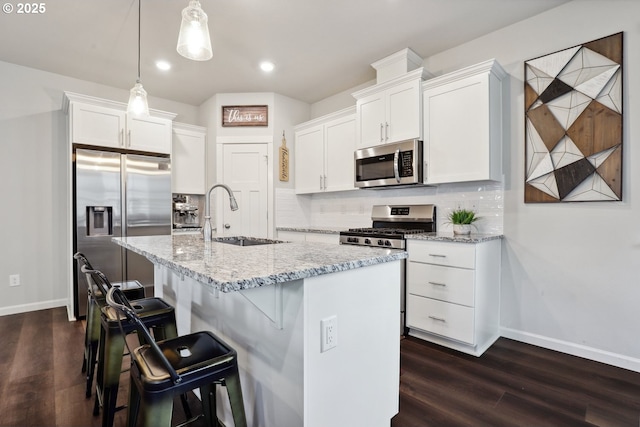 1327 19th Ave, Forest Grove, OR 97116 - kitchen with stainless steel appliances, dark wood-type flooring, white cabinets, and recessed lighting