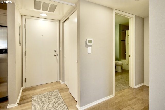 1500 SW Park Ave Unit 206, Portland, OR 97201 - foyer entrance featuring light wood-style floors and baseboards