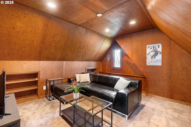 interior space with lofted ceiling, light colored carpet, baseboards, and recessed lighting