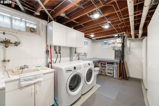 laundry room featuring cabinet space and independent washer and dryer