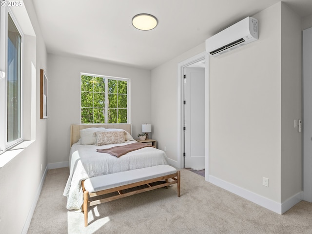 1562 NE 52nd Ave, Portland, OR 97213 - bedroom with an AC wall unit, carpet, and baseboards