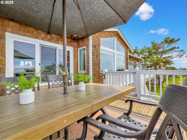 4580 Fairway Ave, Gearhart, OR 97138 - wooden deck with outdoor dining area