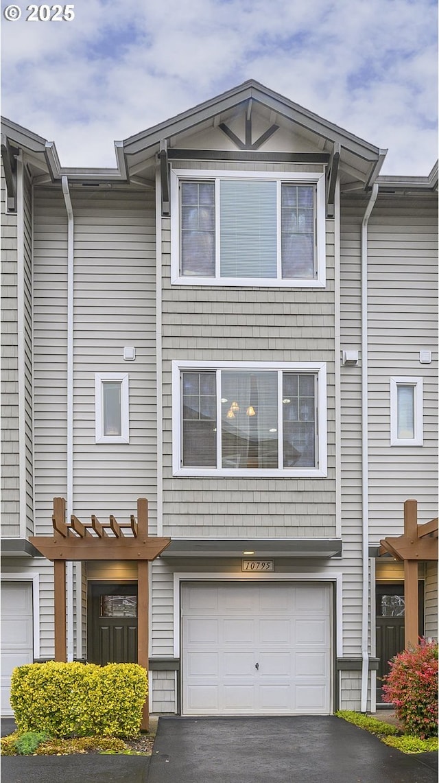 view of property featuring a garage