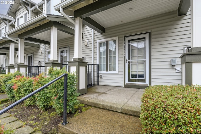 doorway to property with a porch