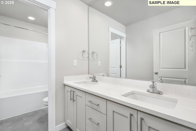 8909 S 3rd St Unit 30, Ridgefield, WA 98642 - bathroom with double vanity, recessed lighting, toilet, and shower / bath combination