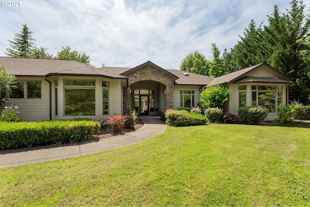 558 Wulff Ln, Roseburg, OR 97471 - view of front of property with stone siding, a front lawn, and french doors