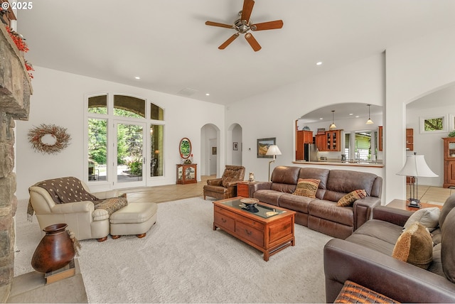 558 Wulff Ln, Roseburg, OR 97471 - living room featuring arched walkways, ceiling fan, healthy amount of natural light, recessed lighting, and a high ceiling