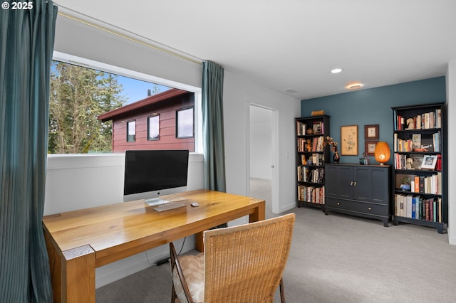 carpeted office with recessed lighting