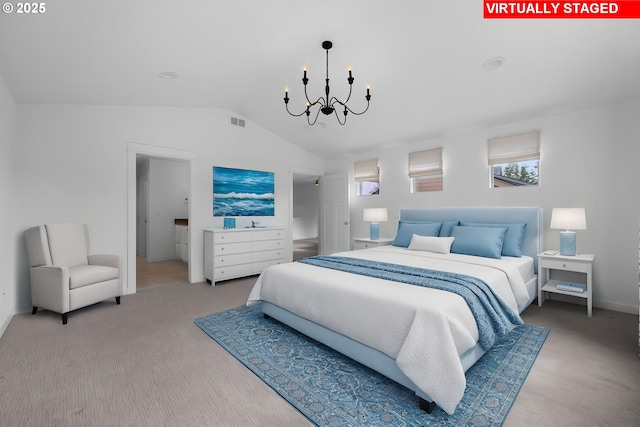 bedroom featuring a chandelier, vaulted ceiling, and baseboards