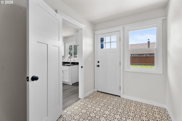 502 Williams Ave, Tillamook, OR 97141 - entrance foyer with baseboards and light flooring