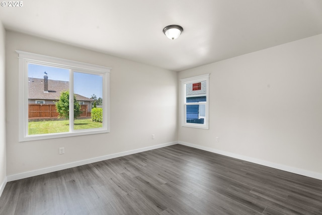 502 Williams Ave, Tillamook, OR 97141 - empty room featuring wood finished floors and baseboards
