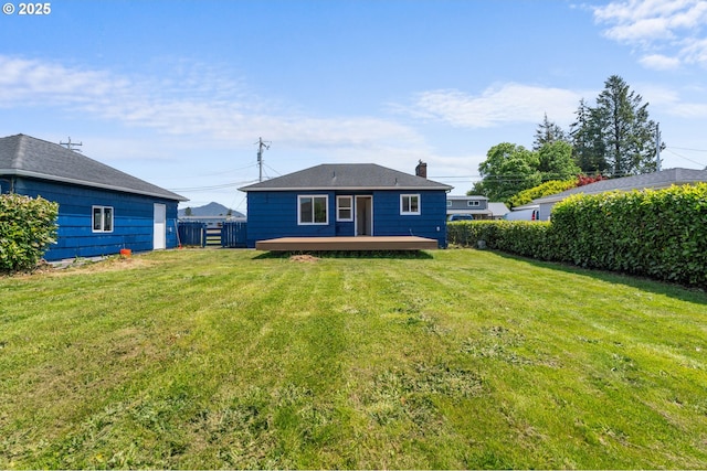 502 Williams Ave, Tillamook, OR 97141 - rear view of property featuring a deck and a chimney
