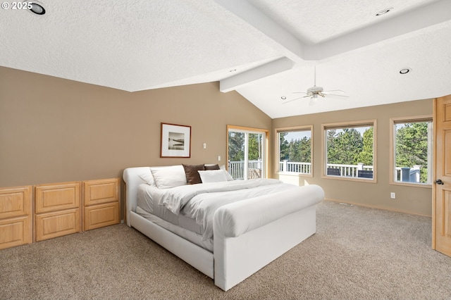 bedroom featuring a textured ceiling, lofted ceiling with beams, and light carpet