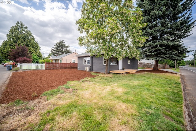 view of yard with a wooden deck