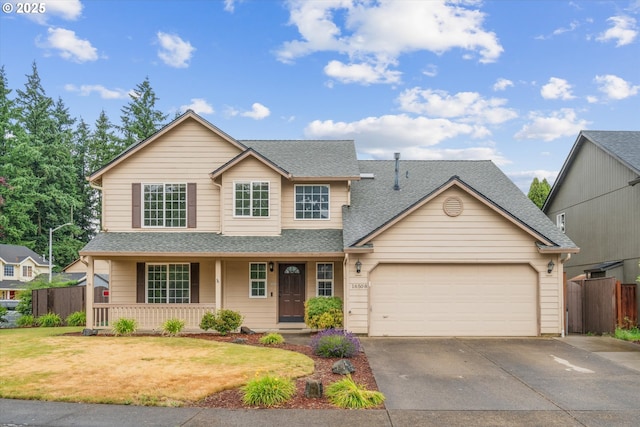 16508 NE 29th St, Vancouver, WA 98682 - traditional home with driveway, roof with shingles, a garage, and covered porch
