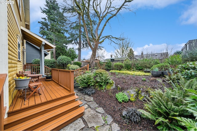 wooden deck featuring fence