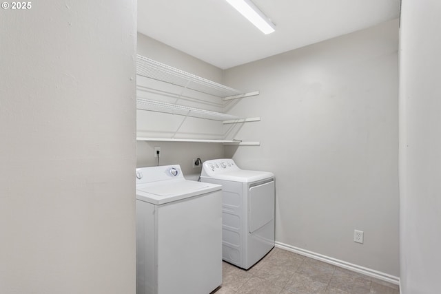 laundry area featuring independent washer and dryer