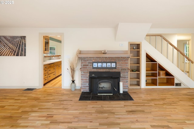 54 W 31st Ave, Eugene, OR 97405 - unfurnished living room with wood finished floors and stairway