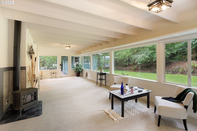 54 W 31st Ave, Eugene, OR 97405 - sunroom with a wood stove, carpet floors, and beamed ceiling