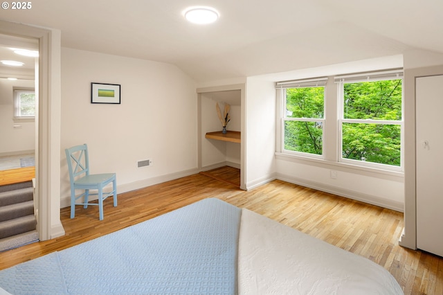 54 W 31st Ave, Eugene, OR 97405 - bedroom with vaulted ceiling and wood finished floors